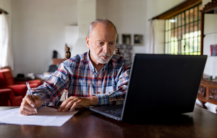 A senior looking up his Social Security benefits.